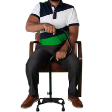 Load image into Gallery viewer, Individual Sitting in Chair Holding Easy Riser Quad Cane