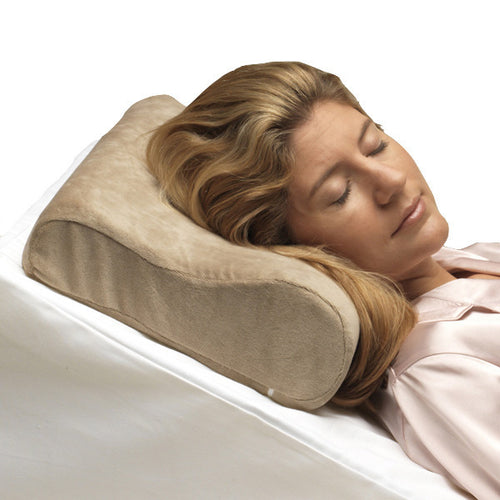 Woman's Head Laying on Memory Foam Cervical Pillow